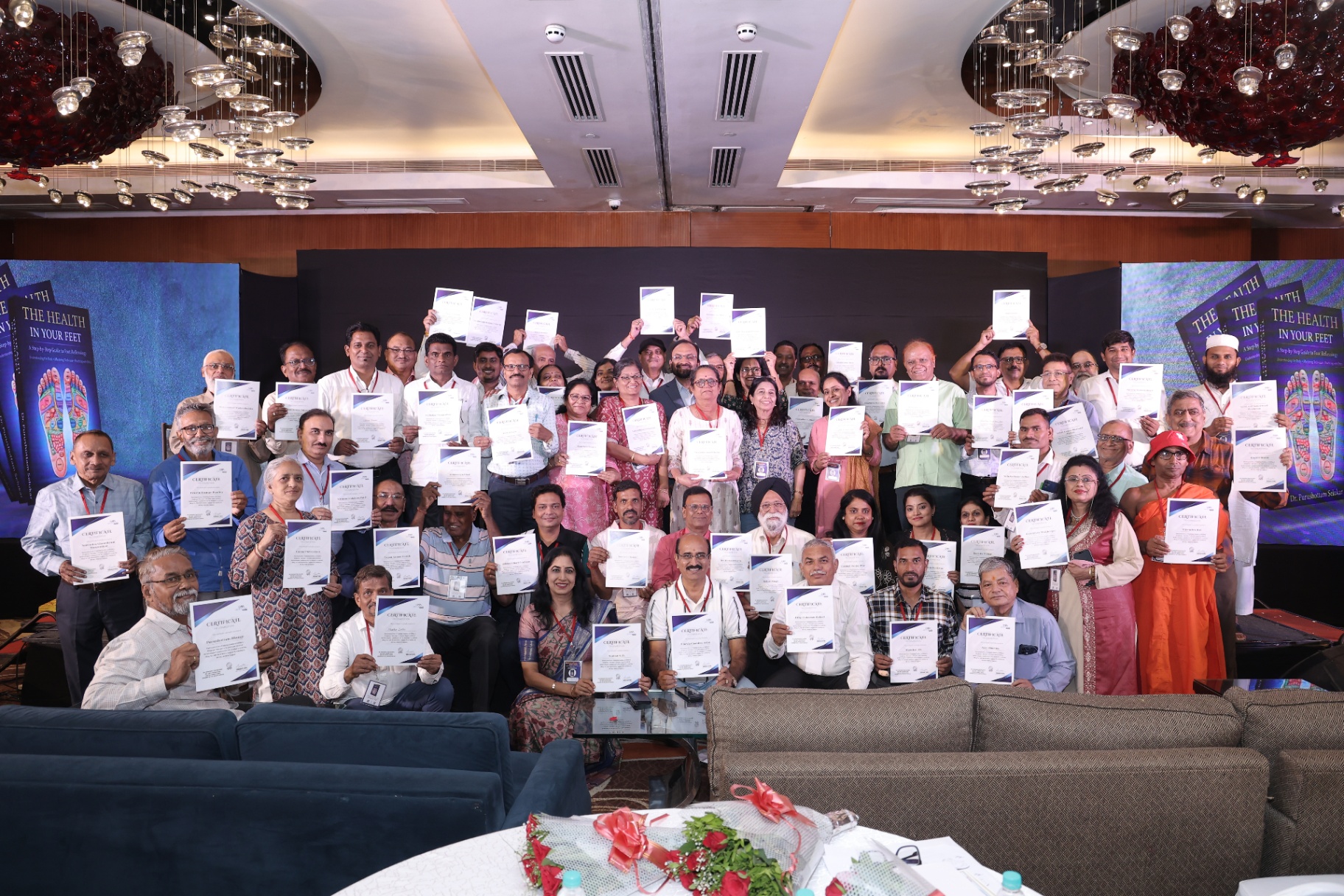 Graduates with 'The Health In Your Feet' book launch cohort
