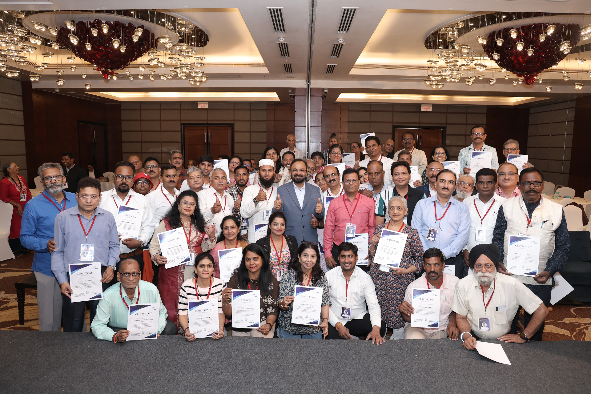 Certified practitioners batch — banquet hall ceremony